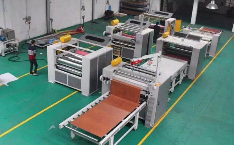 Wrapping machines for wood-based materials